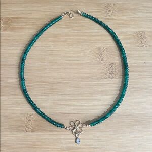 Green Beaded Necklace with Silver Flower Charm